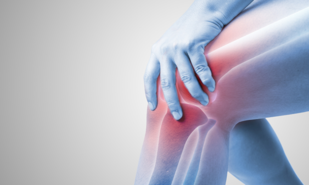 What causes pain behind the knee when walking?